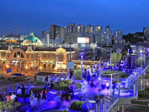 Illuminated roof garden in the city at night